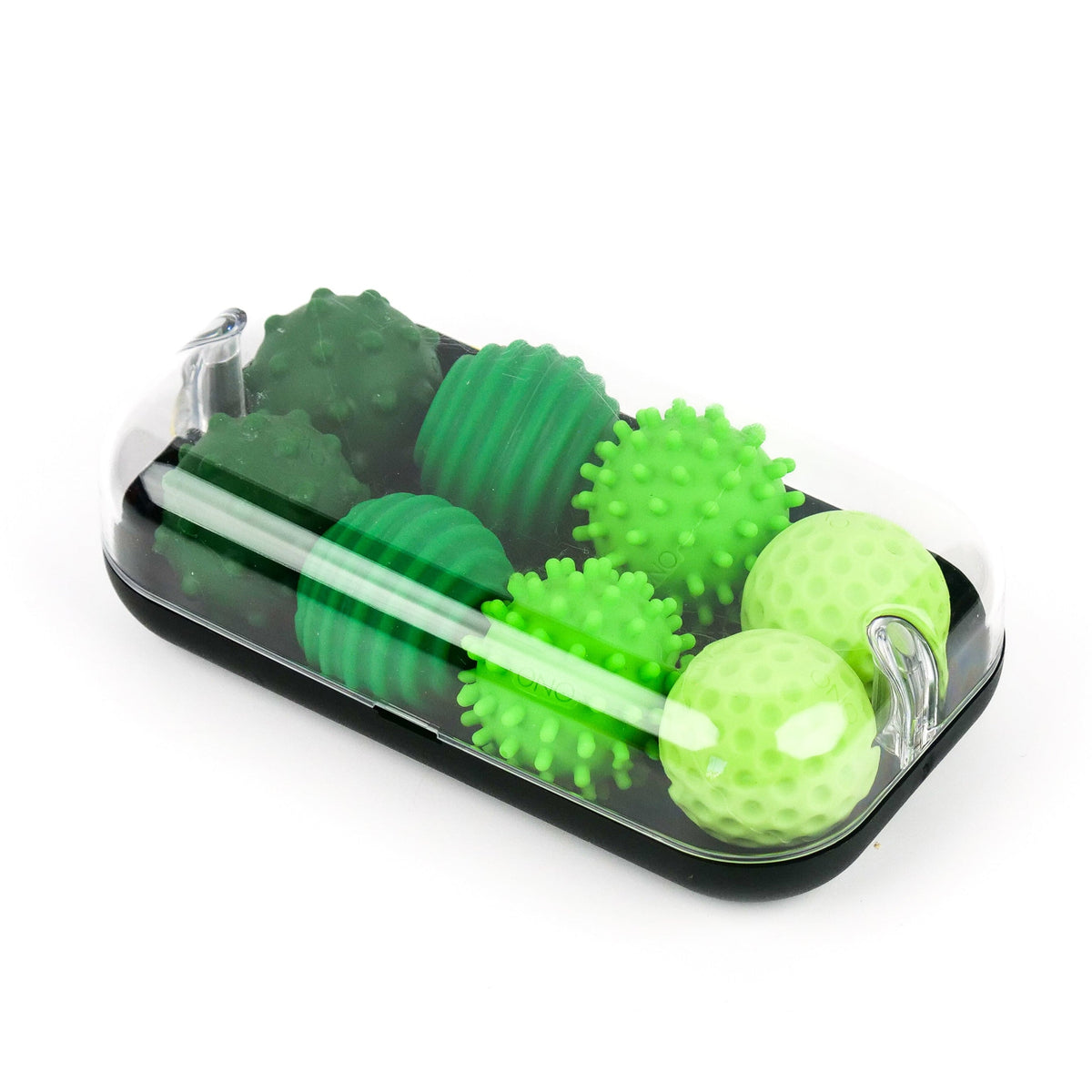 Magnetic fidget balls and sensory toys in green shades with textured surfaces