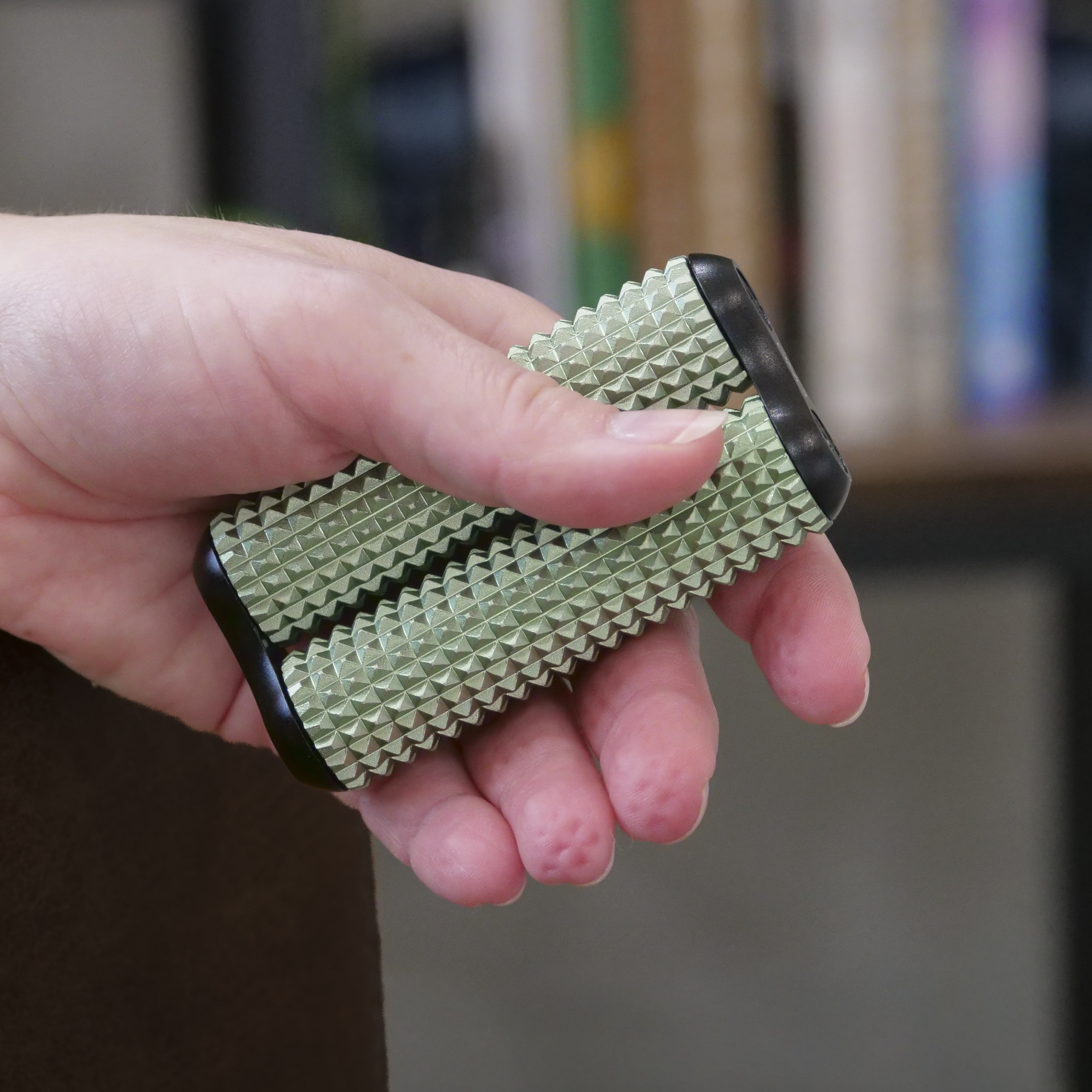 eam_Sage Acupressure_all | Hand holding Sage ONO Roller Acupressure