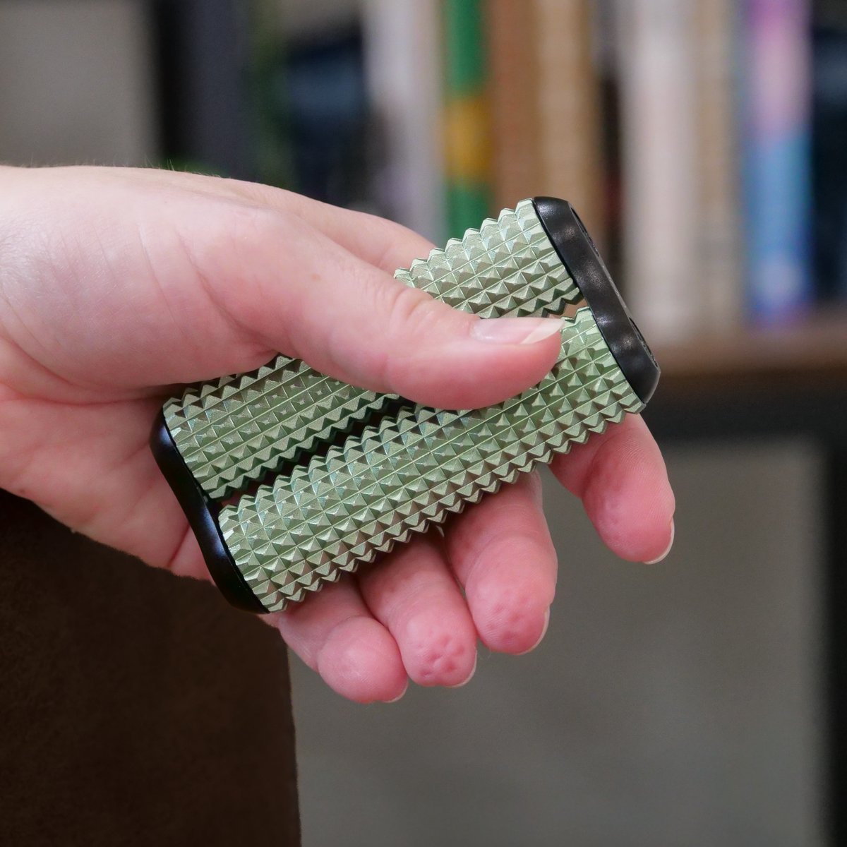 eam_Sage Acupressure_all | Hand holding Sage ONO Roller Acupressure